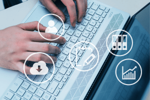 Person, download, archive and other icons displayed on a person typing on a laptop background